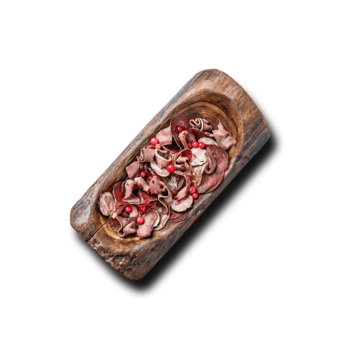 A plate with duck meat, deer heart, and matsik, inspired by traditional Ukrainian game dishes.