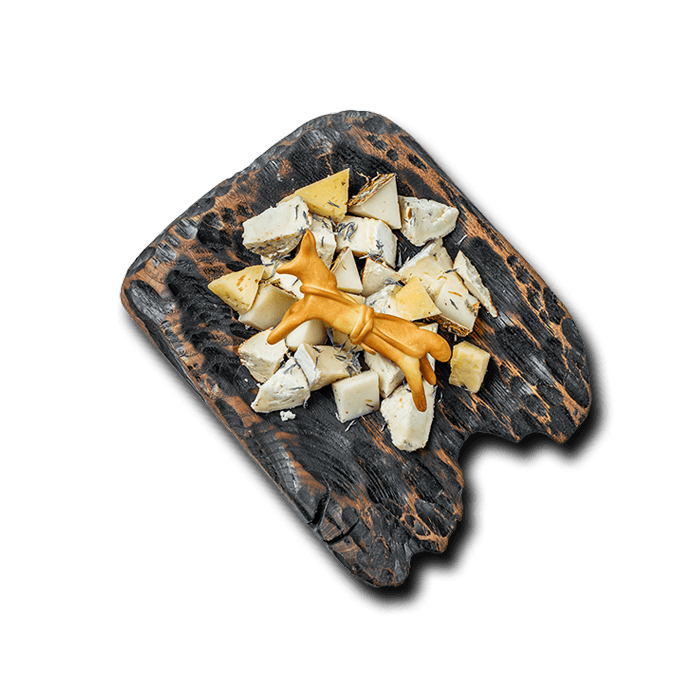 A cheese plate featuring a selection of the best local Ukrainian farm cheeses.